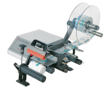 Etiqueteuse semi automatique pour produit cylindrique